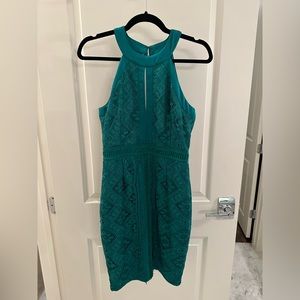 Green cocktail dress! Very flattering. Size small fits like size 4.